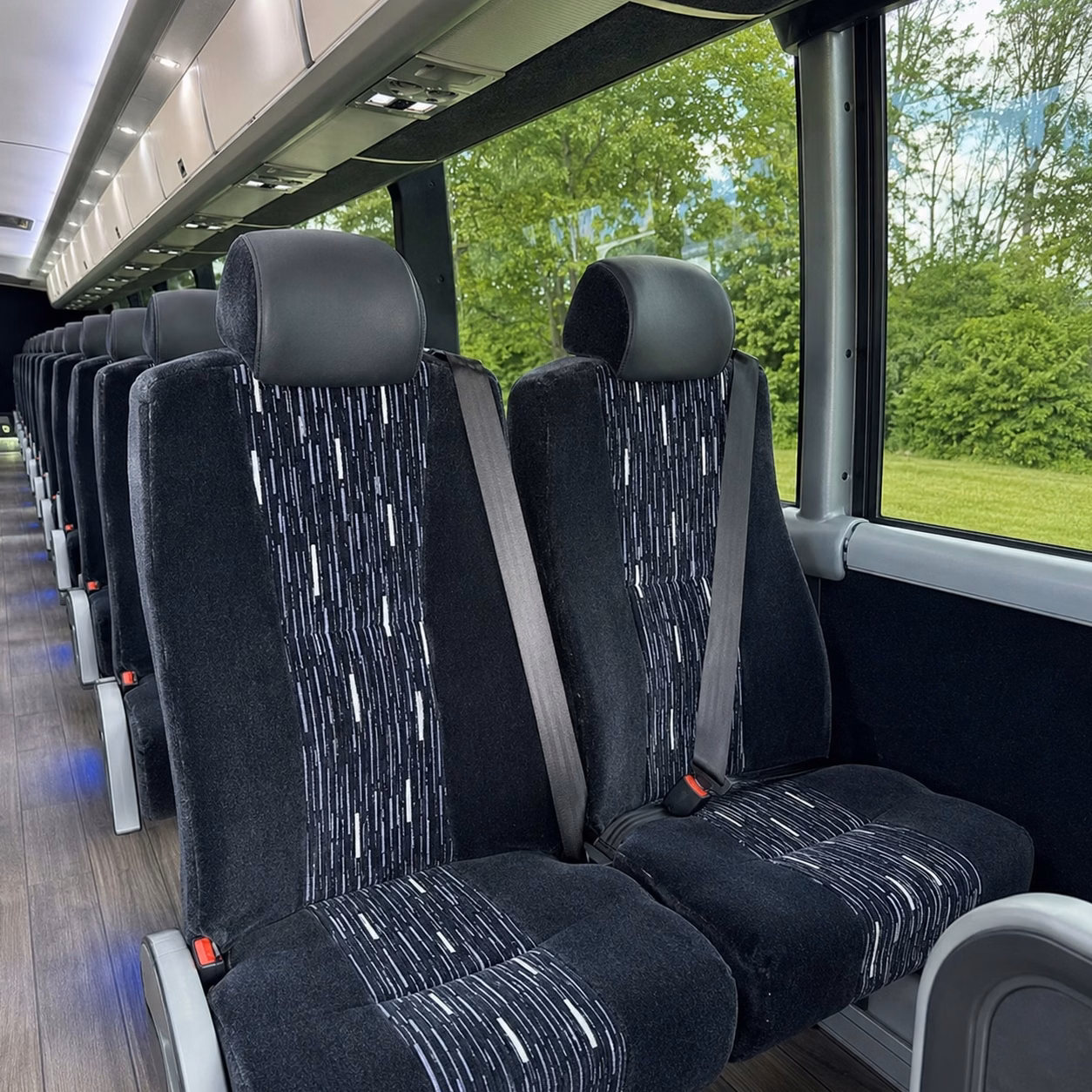 how trip distance and duration affect charter bus rates in woodbury